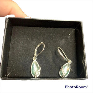 Avon pierced earrings All Wrapped Up green colored stone in silver settings